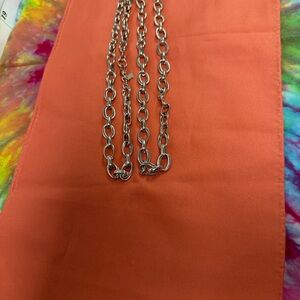 Chic Orange Scarf with Silver Chain Detail